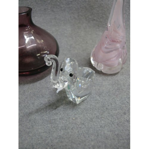 76 - A PINK GLASS CAT BY ALUM BAY GLASS, SMALL CRYSTAL ELEPHANT AND A SMALL PURPLE GLASS BOTTLE.