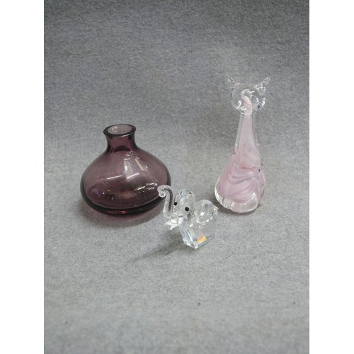 76 - A PINK GLASS CAT BY ALUM BAY GLASS, SMALL CRYSTAL ELEPHANT AND A SMALL PURPLE GLASS BOTTLE.