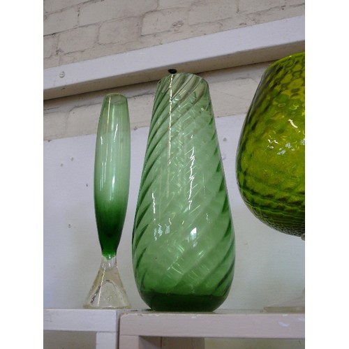 87 - 5 LARGE GREEN GLASS VASES IN VARIOUS STYLES AND SIZES