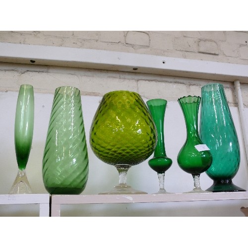 87 - 5 LARGE GREEN GLASS VASES IN VARIOUS STYLES AND SIZES