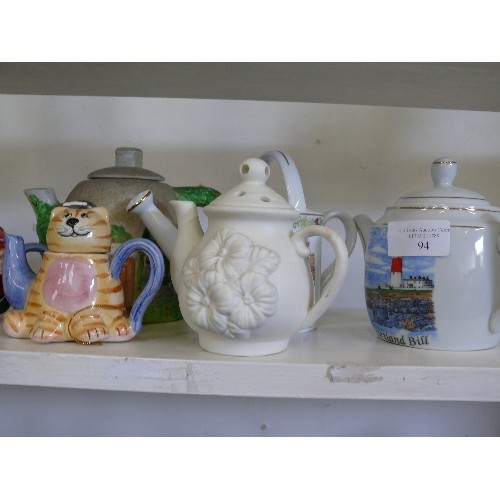 94 - A COLLECTION OF VARIOUS DECORATIVE TEAPOTS