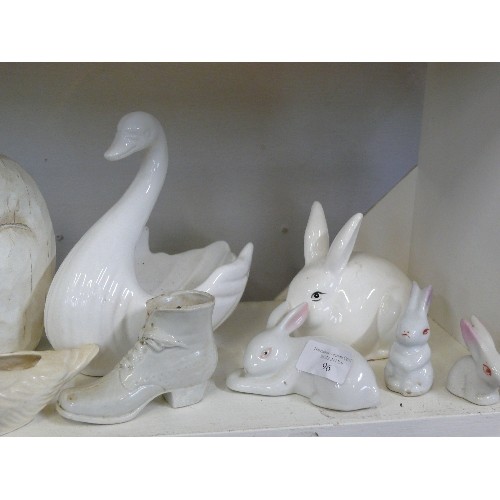 96 - A COLLECTION OF DECORATIVE WHITE CERAMIC ORNAMENTS RABBITS, BIRDS ETC PLUS A WOODEN HARE FIGURE