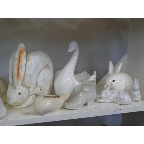 96 - A COLLECTION OF DECORATIVE WHITE CERAMIC ORNAMENTS RABBITS, BIRDS ETC PLUS A WOODEN HARE FIGURE