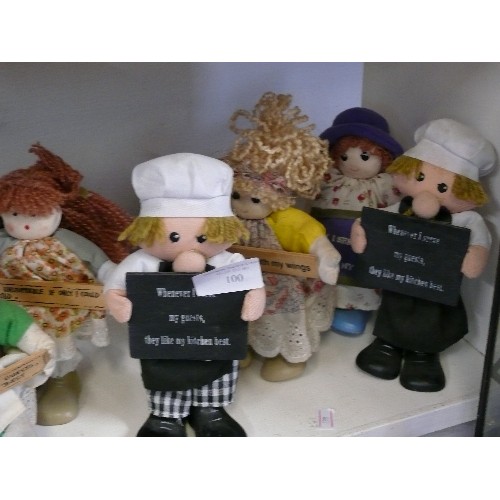 100 - A SELECTION OF VARIOUS DOLL FIGURINES HOLDING MOTIVATIONAL SIGNS