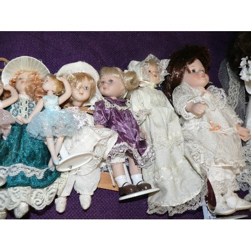 130 - A SELECTION OF DECORATIVE PORCELAIN DOLLS, VARIOUS SIZES