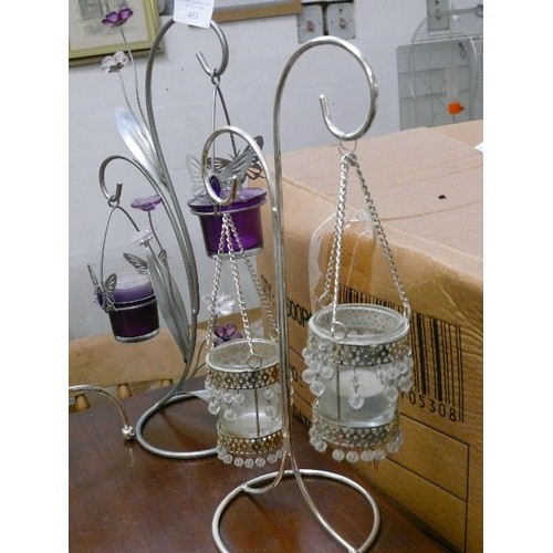 453 - 2 METAL CANDLE HOLDER STANDS AND A JEWELLERY STAND