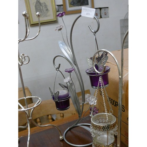 453 - 2 METAL CANDLE HOLDER STANDS AND A JEWELLERY STAND