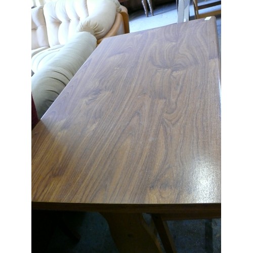 466 - A SMALL PINE FRAMED DINING TABLE WITH FORMICA TOP