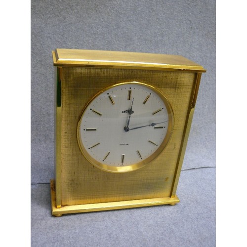 87 - A VERY HEAVY VINTAGE BRASS ELECTRONIC MANTLE CLOCK BY ANGELUS