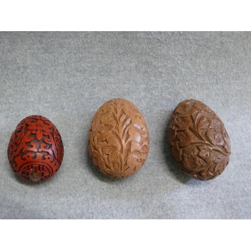 82 - 3 VERY NICE ORNATELY CARVED EGGS