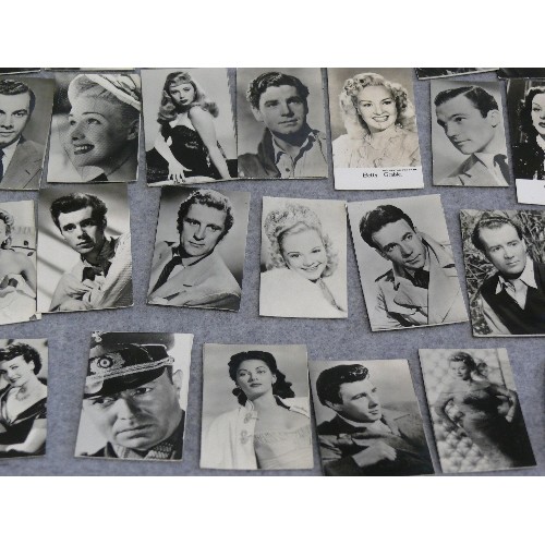 31 - A collection of 30 X 1930's and 40's miniature film star photographs by Rank, Warner Bros, Metro-Gol... 