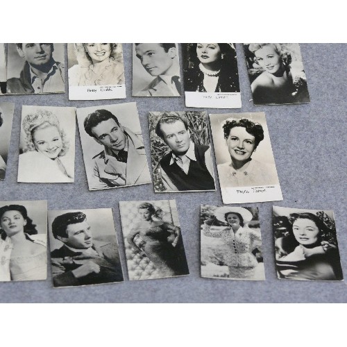 31 - A collection of 30 X 1930's and 40's miniature film star photographs by Rank, Warner Bros, Metro-Gol... 