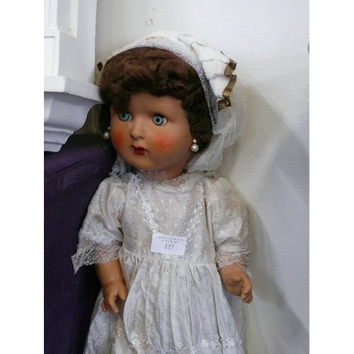 127 - A 1940'S WALKING DOLL