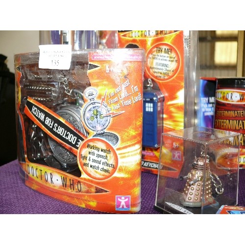 135 - A SELECTION OF NEW AND PACKAGED DOCTOR WHO ITEMS TO INCLUDE SONIC SCREWDRIVERS, KEYCHAINS, SOCKS ETC