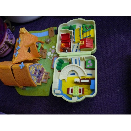 143 - A LARGE COLLECTION OF POLLY POCKET PLAYSETS