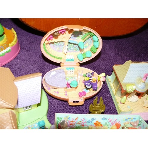 143 - A LARGE COLLECTION OF POLLY POCKET PLAYSETS