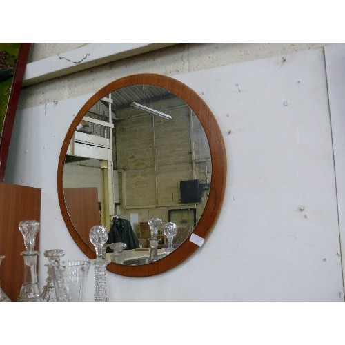 169 - A ROUND TEAK FRAMED MIRROR