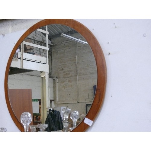 169 - A ROUND TEAK FRAMED MIRROR