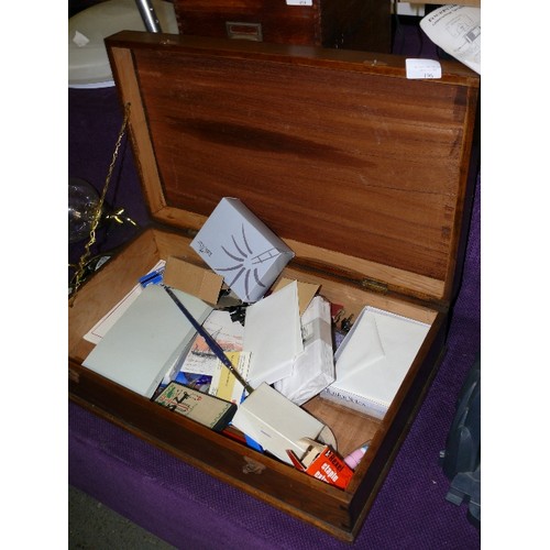 196 - A LARGE OAK STATIONERY BOX WITH CONTENTS OF STATIONERY