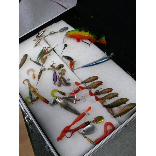 226 - AN ALUMINIUM CASE OF FISHING LURES