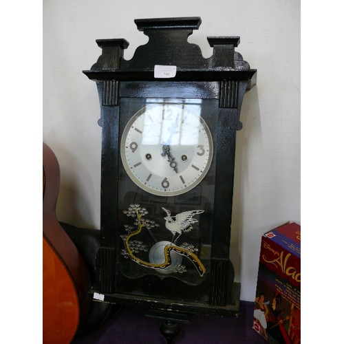 140 - A JAPANESE BLACK LACQUER WALL CLOCK WTH BEAUTIFUL BIRD DETAIL