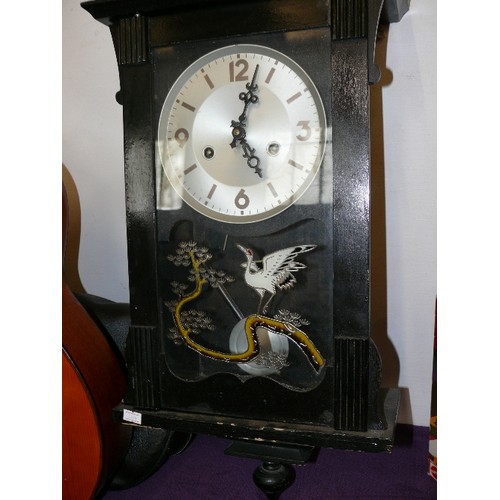 140 - A JAPANESE BLACK LACQUER WALL CLOCK WTH BEAUTIFUL BIRD DETAIL