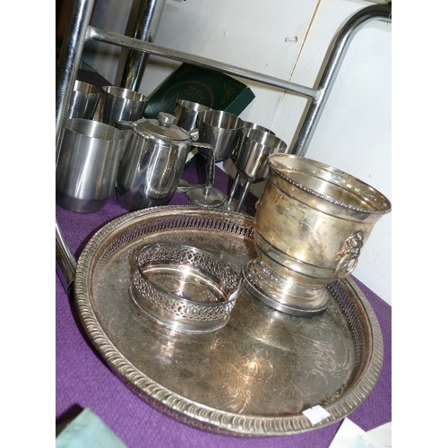 162 - A SILVER PLATE GALLERIED TRAY AND BOTTLE COASTER PLUS STAINLESS STEEL GOBLETS ETC