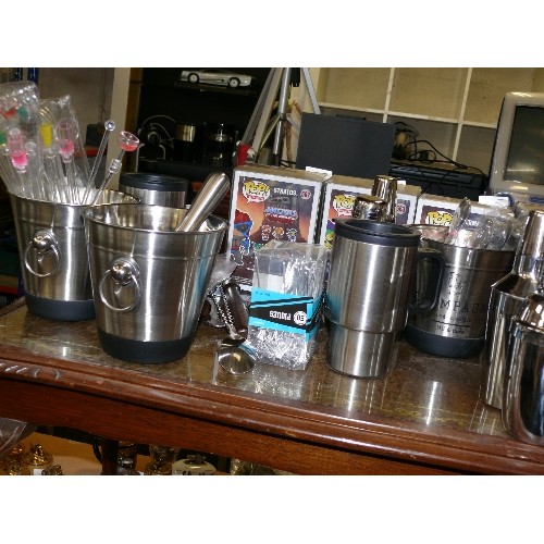 233 - A LARGE SELECTION OF COCKTAIL ITEMS TO INCLUDE SHAKERS, ICE BUCKETS, WHISKS ETC