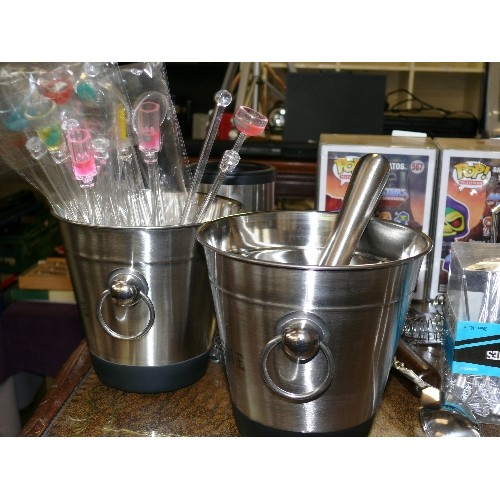 233 - A LARGE SELECTION OF COCKTAIL ITEMS TO INCLUDE SHAKERS, ICE BUCKETS, WHISKS ETC