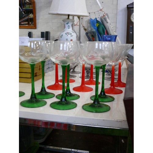 260 - VARIOUS GLASSES SETS WITH COLOURED STEMS