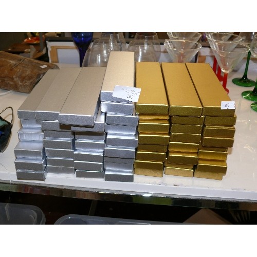 262 - A LARGE QUANTITY OF GOLD AND SILVER COLOURED JEWELLERY BOXES