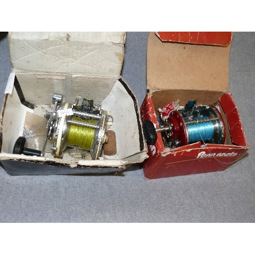 279 - A MITCHELL GARCIA 602P FISHING REEL AND A PENN 209MS FISHING REEL, BOTH BOXED