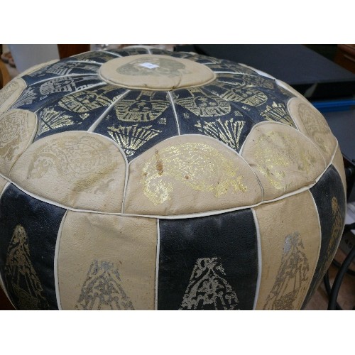 348 - A VINTAGE BLACK AND CREAM LEATHER EGYPTIAN POUFFE STOOL