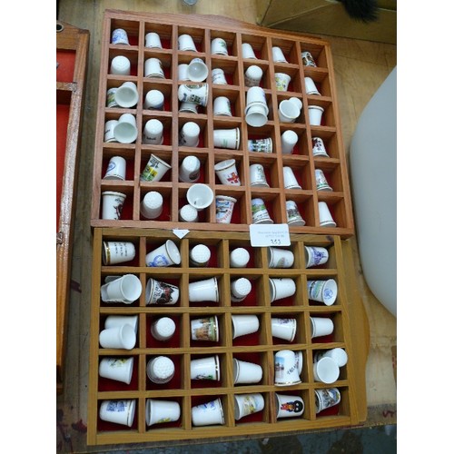 353 - 2 WOODEN DISPLAY CASES WITH CONTENTS OF COLLECTABLE THIMBLES