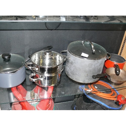 388 - A SELECTION OF SAUCEPANS