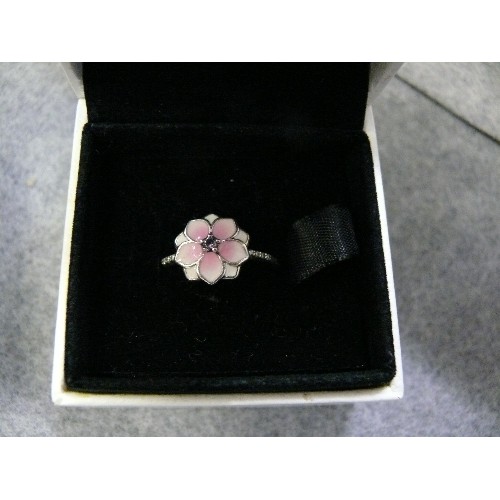 23 - 2 SILVER PANDORA RINGS 1 WITH ENAMEL FLOWER THE OTHER LIKE A CHARM RING