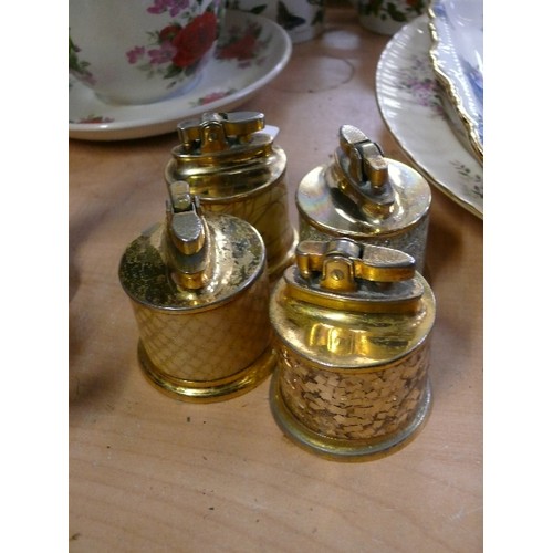 241 - 4 DECORATIVE BRASS TABLE LIGHTERS