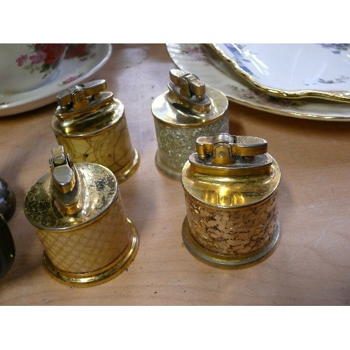 241 - 4 DECORATIVE BRASS TABLE LIGHTERS