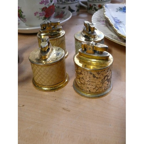 241 - 4 DECORATIVE BRASS TABLE LIGHTERS