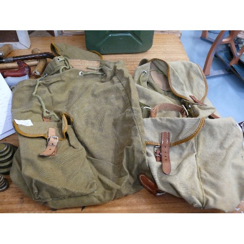 416 - 2 X CANVAS AND LEATHER RUCK SACKS, POSSIBLY MILITARY