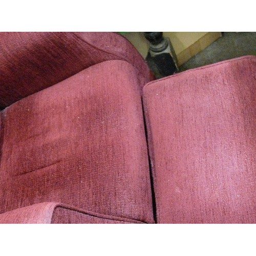 486 - HIS AND HERS FIRESIDE CHAIRS IN BURGUNDY, ONE WITH A FOOTSTOOL