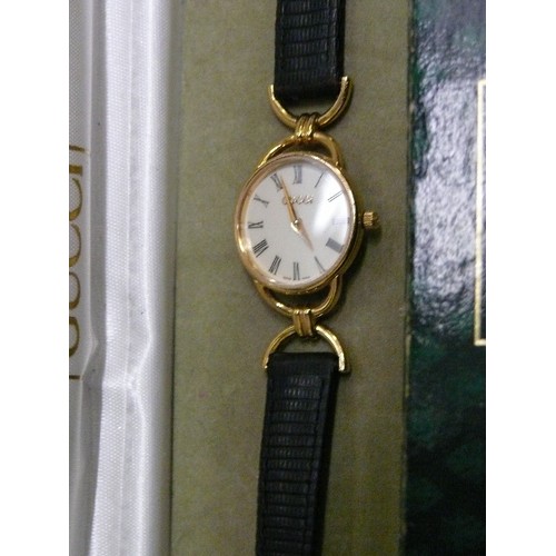 48 - A FINE GENUINE GUCCI CLASSIC STYLE WATCH HARDLY WORN HAS REG NUMBER 0213808 ,IN ORIGINAL BOX