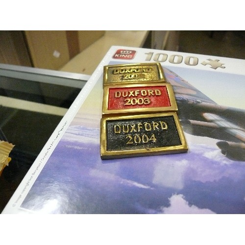 51 - 3 BRASS DUXFORD PLAQUES  2002, 2003 AND 2004, AVRO LANCASTER 1000 PIECE JIGSAW, BOOKS LINCOLN AT WAR... 