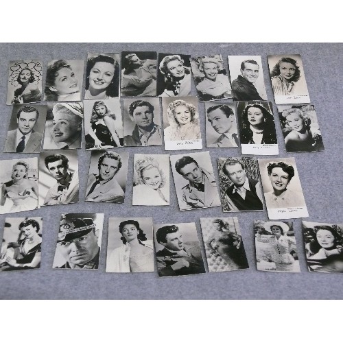 31 - A collection of 30 X 1930's and 40's miniature film star photographs by Rank, Warner Bros, Metro-Gol... 