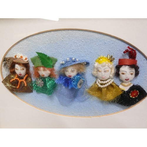 72 - A FRAMED DISPLAY OF 5 HANDMADE HEAD AND SHOULDER TOROS WITH ELEGANT DRESSING