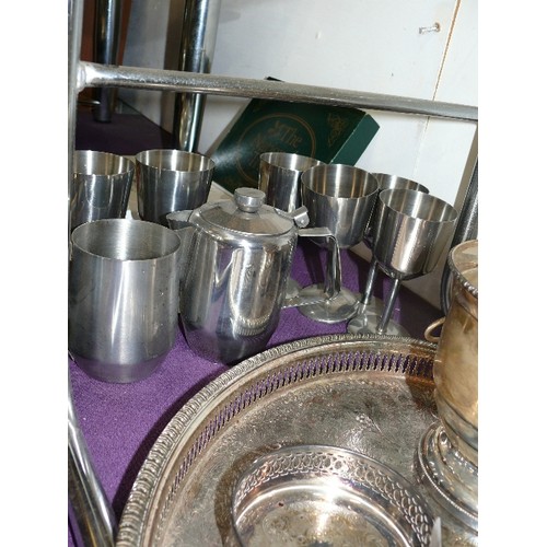 162 - A SILVER PLATE GALLERIED TRAY AND BOTTLE COASTER PLUS STAINLESS STEEL GOBLETS ETC