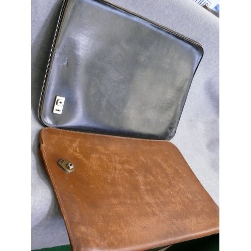 296 - TWO VINTAGE LEATHER ZIP FOLDERS