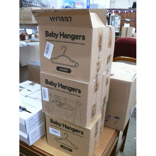 334 - 6 BOXES OF NEW BABY COAT HANGERS IN 4 COLOURS (48 PER BOX)