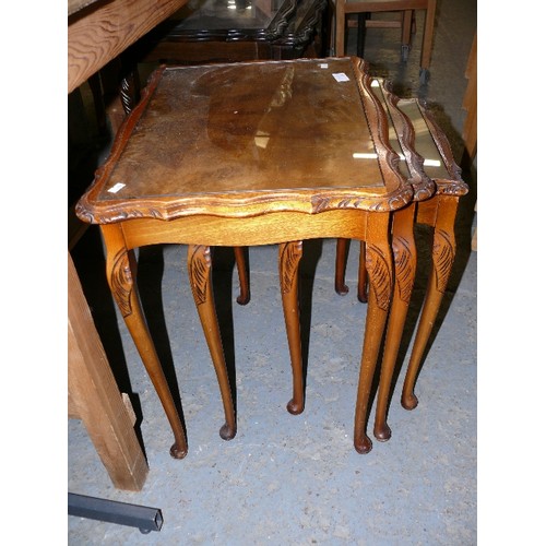 398 - A GLASS TOPPED NEST OF 3 SIDE TABLES