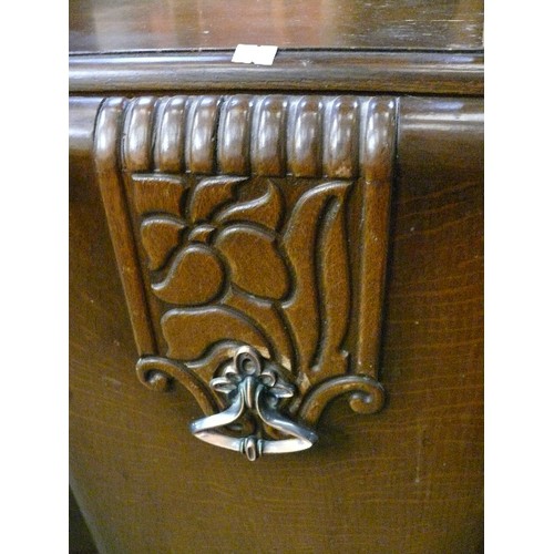 410 - LARGE VINTAGE SOLID BOW FRONTED SIDEBOARD, 4 CENTRAL DRAWERS, 2 CUPBOARDS AND HEAVY CARVED DETAIL